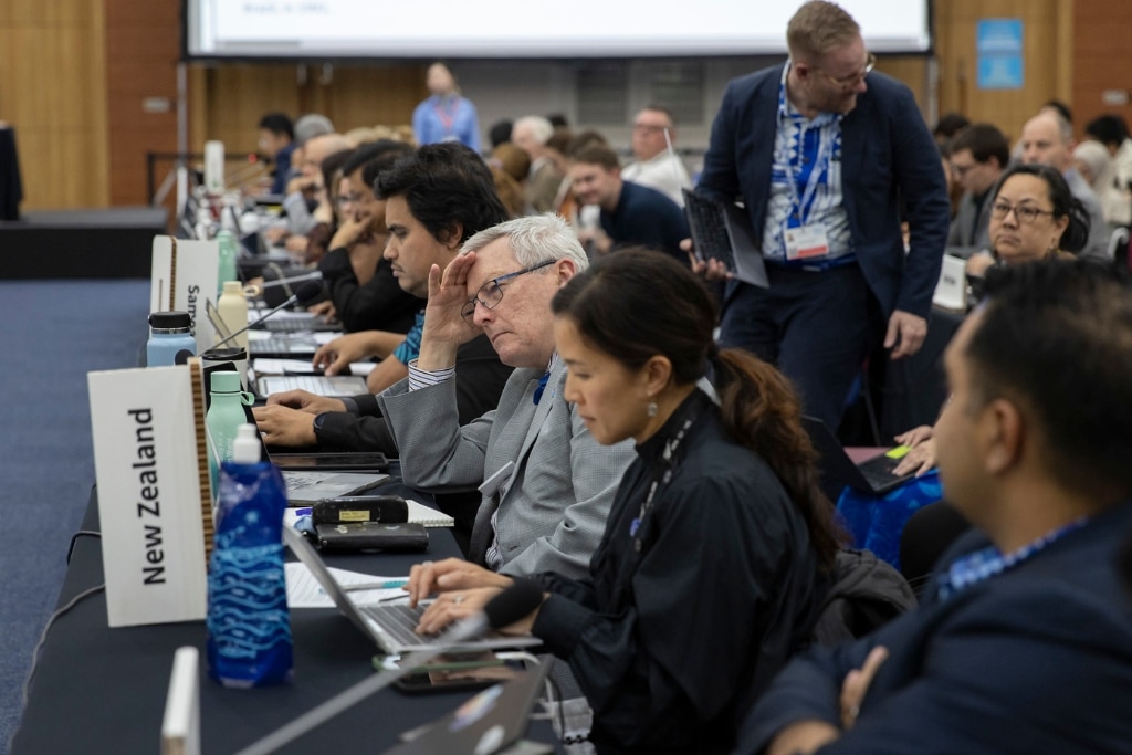 Delegates attend the fifth session of the Intergovernmental Negotiating Committee to develop an international legally binding instrument on plastic pollution, including in the marine environment (INC-5), held in Busan, Republic of Korea, in November 2024.